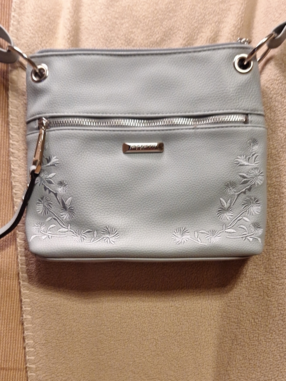 Rosetti Light Blue Floral Embossed Crossbody Purse. Never Been Used